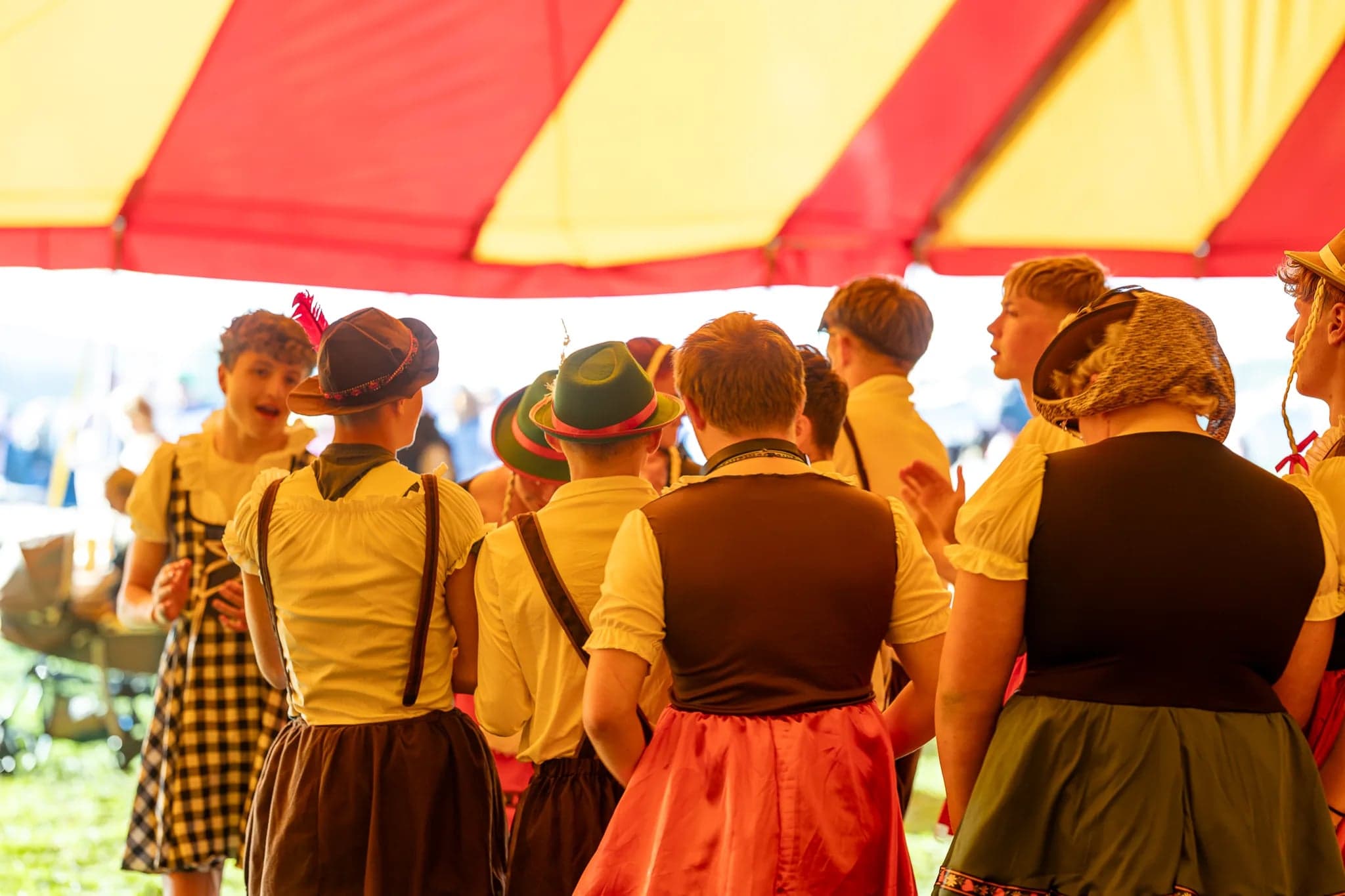 lederhosen crew under the big top